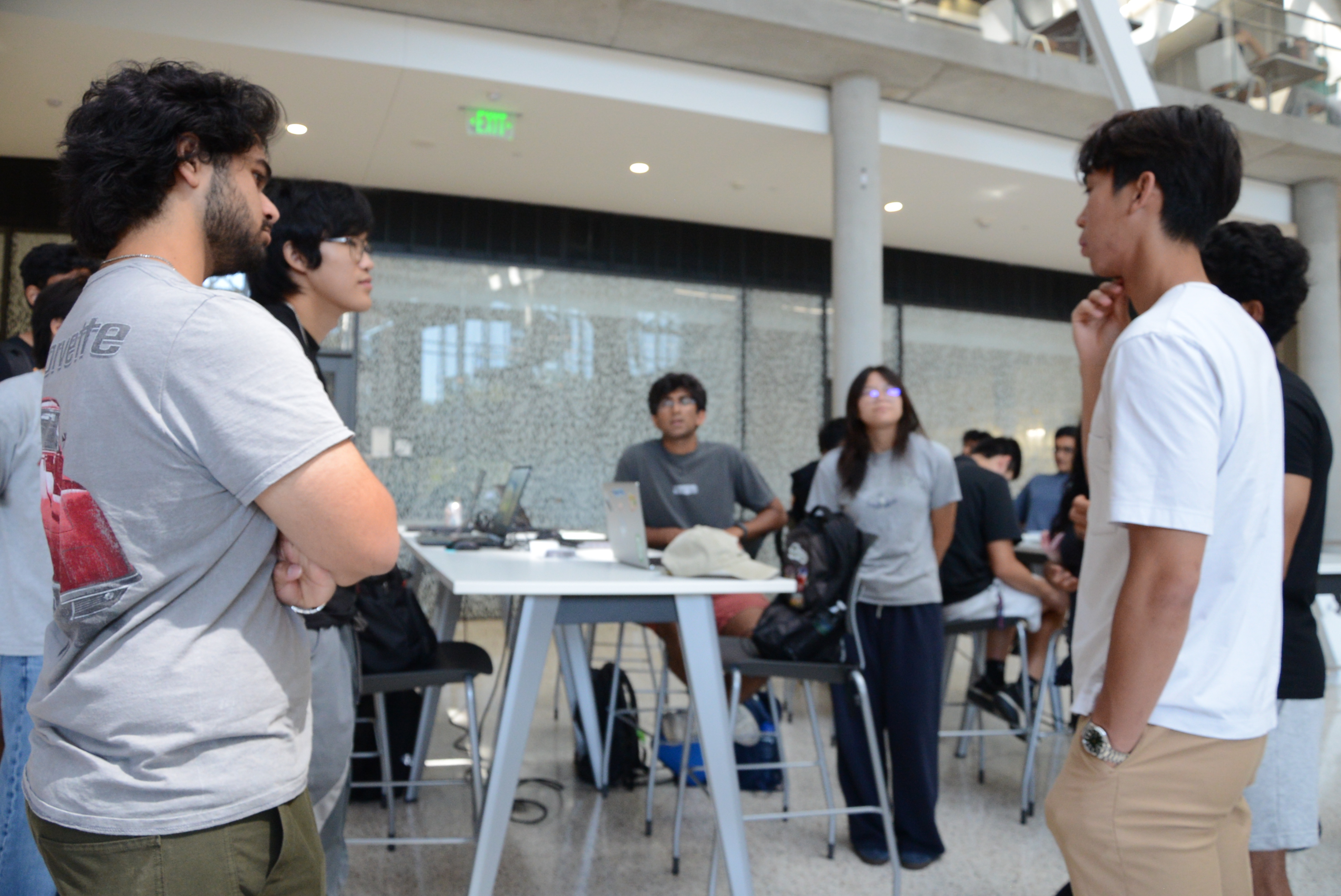 Team members discussing robot design